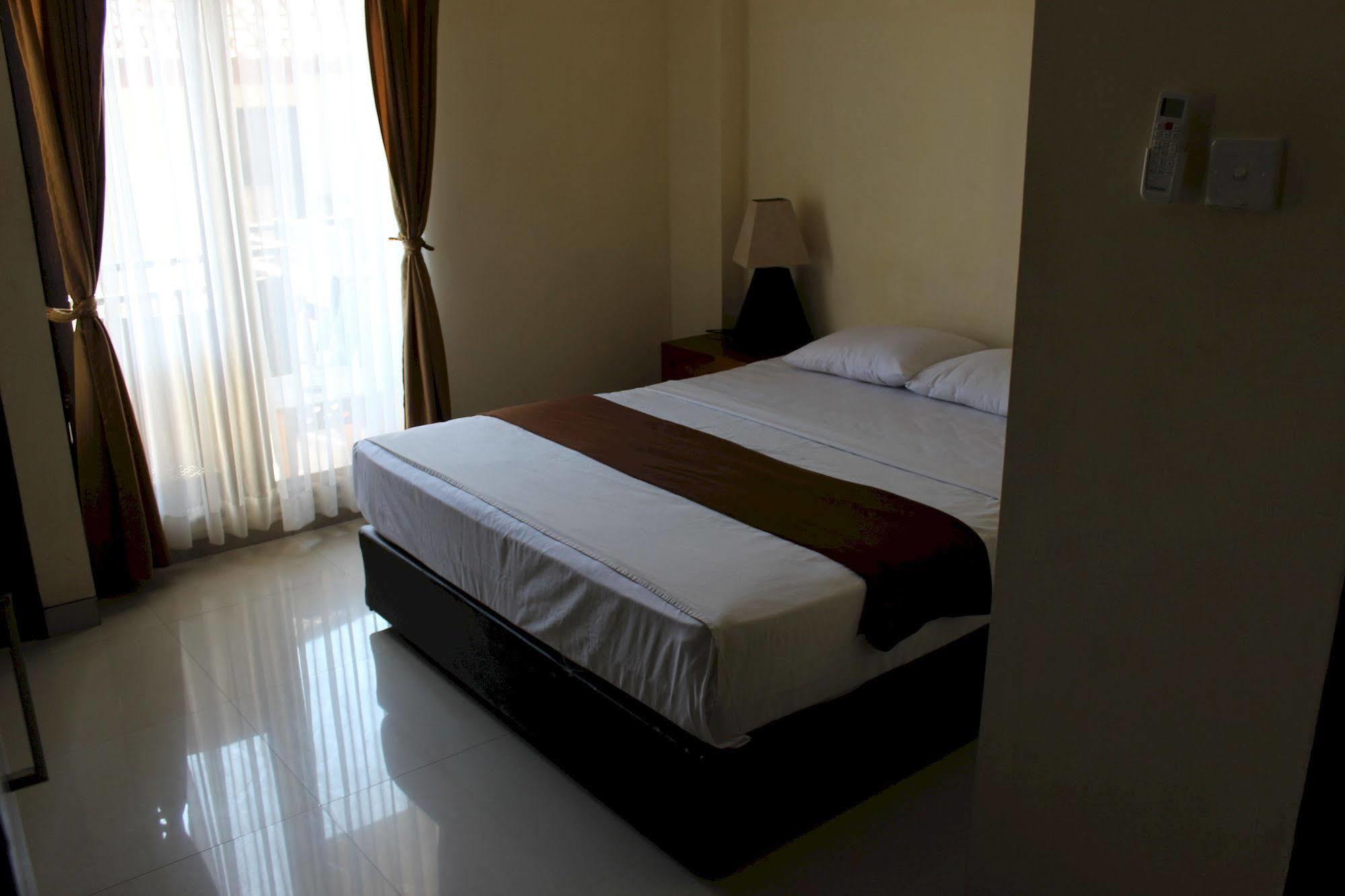 קוטה לומבוק Ayu Beach Inn מראה חיצוני תמונה